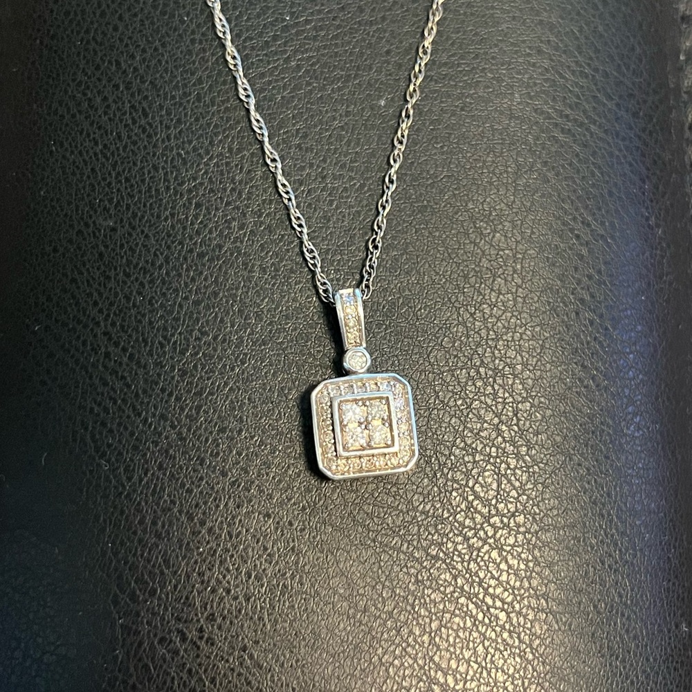 Diamond necklace in stainless setting. Vintage style pendant. From Zales